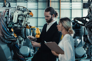 Robotic factory owner explain, discuss functionality and performance of robot systems with client. Answering questions about after-sales service. Price negotiation. Developing long-term relationships