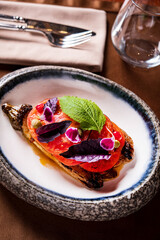 grilled vegetables with sauce closeup