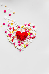 Pile of colorful medicine pills, vitamins on white background. top view.selective focus. Tablets pharmacy concept.drugs pills heap.Medication treatment, pharmacy and medicine.copy space