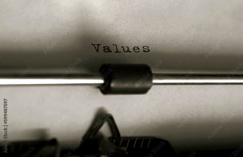 Poster text values typed on retro typewriter