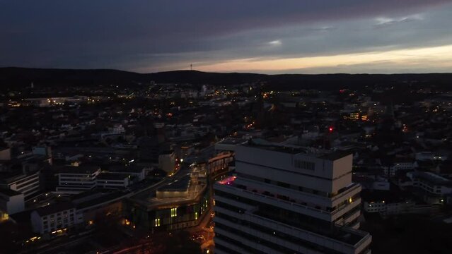 Aerial night Cityscape of Kaiserslautern City center at sunset : ( K-town ) in west Germany known for the U.S military Community of Ramstein Air force Base settling in the city.