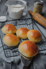 Homemade White Bread with Flour, Milk and Rolling Pin on the background