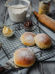 Homemade Chocolate Bread with Chocolate, Flour, Milk and Rolling Pin on the background