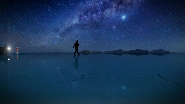 Flight over tourists at the Uyuni Salt Flats, Bolivia, against starry sky 