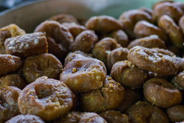 Balushaahi or balushai or makhan bada kept in a large bowl for selling in sweet shop. It is a very popular traditional dessert from odisha. It is made of flour.
