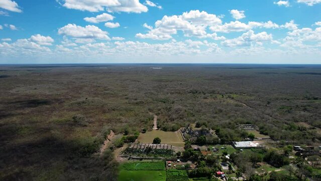 frontal drone shot of mayan ruins abandoned at yucatan jungle in mexico