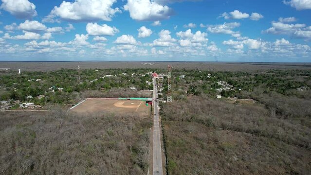 drontal aerial shot of town of tahmek yucatan during hewavy drought