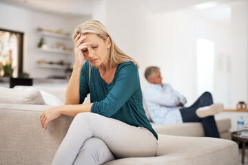 Obraz premium Is it really worth it. a mature woman looking despondent after having a fight with her husband at home.
