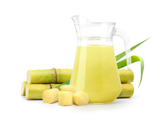 Fresh squeezed sugar cane juice with fresh cane sliced isolated on white background.