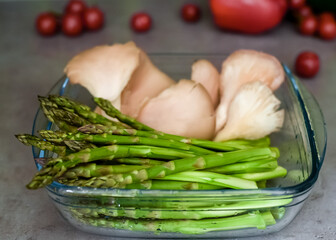 Asparagus and oyster mushrooms, close-up