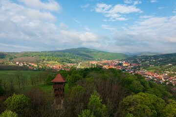 Fototapeta na wymiar Aerial view about Varhegy lookout tower which is located not far from the Schlossberg castle ruins. Hungarian name is Var-hegyi kilato