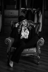 Modern attractive European lady in suit. White shirt and black trousers. Women's wardrobe details and illustration