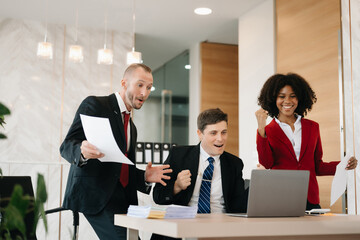 Young  business team creative businesspeople coworker, teamwork celebrating achievement and in planning design in creative in office.