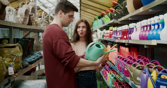 Choosing the Right Garden Watering Can: Couple's Indecision at the Store