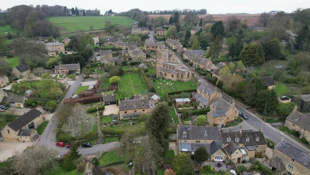 Bourton on the Hill Cotswold village UK drone aerial view in spring