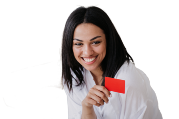 Cheerful Young African american entrepreneur with straight hair and toothy smile holding credit card, satisfied by her growing business. Happy successful girl against transparent background.