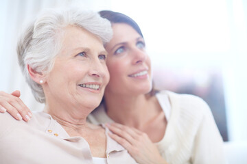 Tender moments with Mom. an affectionate mother and daughter spending time together at home.