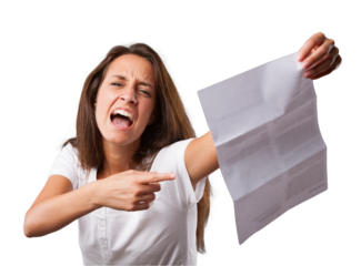 Emotional portrait of a young woman isolated on a neutral background. She points to a letter she's holding, her face showing anger and frustration, a negative reaction to the injustice and problems co