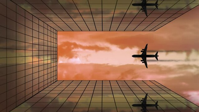 Silhouette of plane in red sunset sky over solar panels