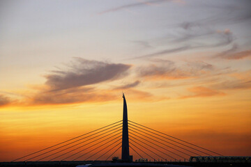 cable bridge at sunset