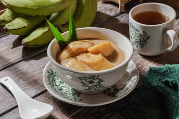 Sweet dessert Malaysia people called Pengat Pisang and Indonesian people called Kolak Pisang Ubi. It is made from banana and coconut milk.