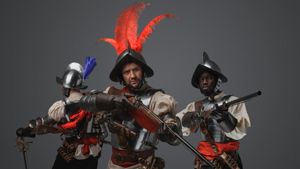 Shot of medieval spanish soldiers with flintlock guns and cuirasses.