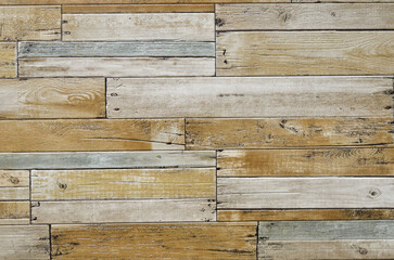 Naklejka premium background from short wooden boards in light yellow-gray-brown tones. old wood background.