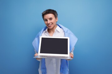 remote professions business concept. young woman holding a laptop in her hands