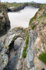 Rock arch at Paraia dos Castors beach