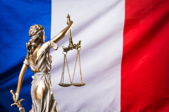The statue of justice Themis or Justitia, the blindfolded goddess of justice against the flag of Brazil, as a legal concept	
