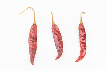 Dried red chili on white background. Clipping path included.