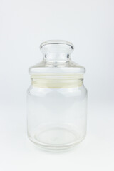 Empty glass jar isolated on white background, can be used as a background