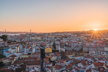 Fototapeta na wymiar City skyline of the old Alfama district in Lisbon at dusk