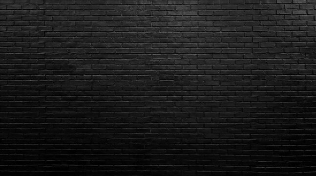 black brick wall texture for pattern background. architectural wide panorama brick work wall for rustic, industrial, loft design. close up view of building facade wall.