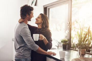 They are a perfect match. an affectionate young couple at home.