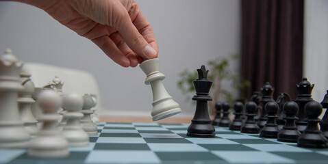 close up, playing chess at home. Selective focus.