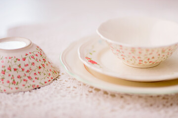 Closeup of porcelain plates and bowls