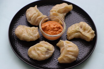 Veg steam momo. Nepalese Traditional dish Momo stuffed with vegetables and then cooked and served with sauce