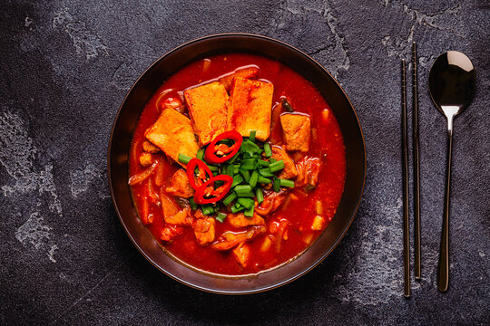 Korean traditional food, spicy kimchi soup (kimchi tige) with pork and tofu cheese.