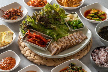 Set Menu of Napa Wraps with Pork Korean food dish meal Set Menu with Braised Fish Soft Tofu Stew Stir-fried chicken in earthen pot Set Menu with Marinated Beef Ribs
