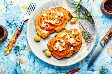 Tasty breaded chicken meat steaks