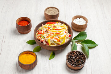 front view delicious chicken salad with different seasonings on white desk snack ripe meal meat fresh salad