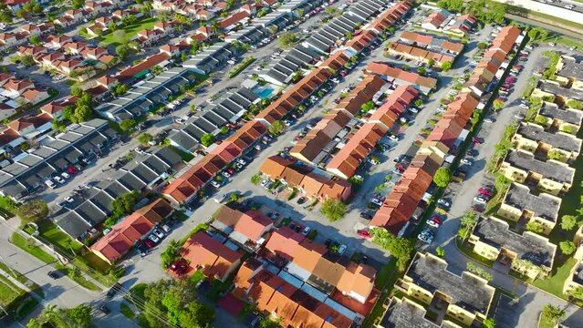 Top view of new apartment condos in Florida suburban area. Family housing in quiet neighborhood. Real estate development in american suburbs