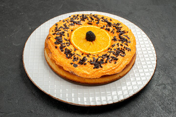 front view delicious pie with chocolate chips and orange slices on dark background tea pie dessert cake fruit biscuit