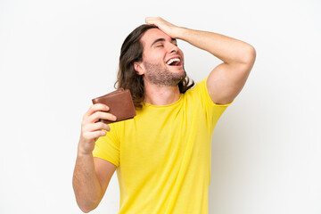Fototapeta premium Young handsome man holding a wallet isolated on white background has realized something and intending the solution