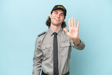 Young safeguard man isolated on blue background counting five with fingers