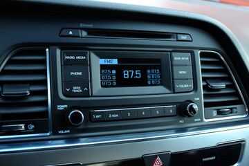Car detailing. Car multimedia and climate control. Modern car interior details. 