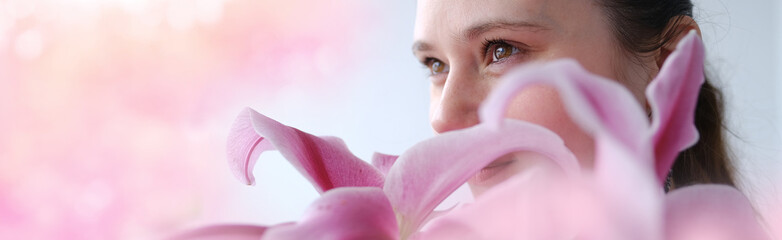 close up part of woman's face in flowers, beautiful girl 30 years old, human eyes looking to side,...