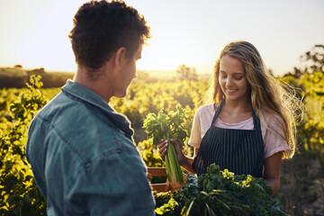 Farming experts doing what they do best. a young man and woman working together on a farm.