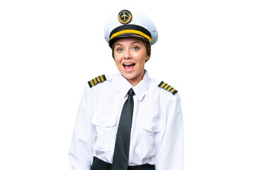 Airplane pilot woman over isolated chroma key background with surprise facial expression